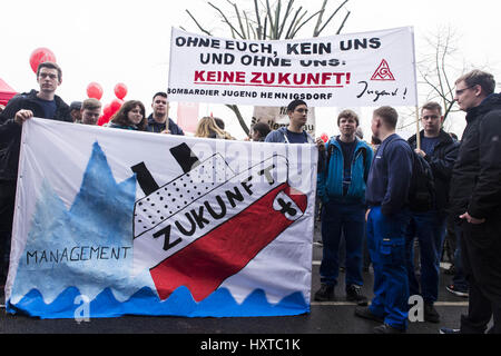 Berlin, Berlin, Germany. 30th Mar, 2017. On the day of the Supervisory Board meeting of Bombardier, 1000 employees from the German sites demonstrate after a call of the trade union IG Metall in front of the company headquarters in Berlin. At Bombardier, a Canadian aircraft and railway group, a total of 5000 jobs will be dropped by the end of 2018. [German: Am Tag der Aufsichtsratsitzung von Bombardier streiken 1000 BeschÃ¤ftigte aus den deutschen Standorten nach Aufruf der Gewerkschaft IG Metall vor der Firmenzentrale in Berlin. Credit: ZUMA Press, Inc./Alamy Live News Stock Photo