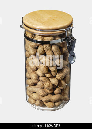 peanuts in shell inside a crystal jar Stock Photo