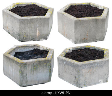 Big hexagonal vintage concrete flowerpots are filled with soil compost and are ready to landing of spring flowers. Isolated set Stock Photo