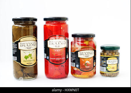 Hai, Ukraine -14 March 2017: Different canning in brine on pot Buono isolated on white. Stock Photo