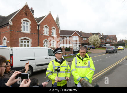 West Midlands Police Superintendent Lee Kendrick (left) and West Midlands Ambulance Service NHS Foundation Trust Assistant Chief Steve Wheaton speak to the media near the scene where a 13-year-old boy and his mother died after being stabbed at their home in Greyhound Lane, Stourbridge. Stock Photo
