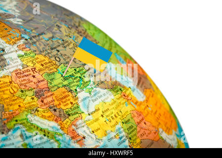 Map with Flag Ukraine. Globe detail with Selective Focus on Ukrainian flag Stock Photo