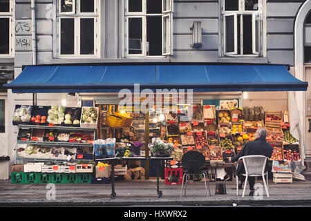 A greengrocer in the Norrebro district in Copenhagen, Denmark. The neighborhood is known for his multicultural flair with a lot of middleastern immigr Stock Photo