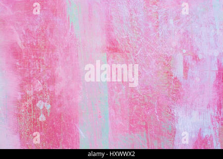 Grungy red roughcast wall scratchy background texture in pink and green. Stock Photo