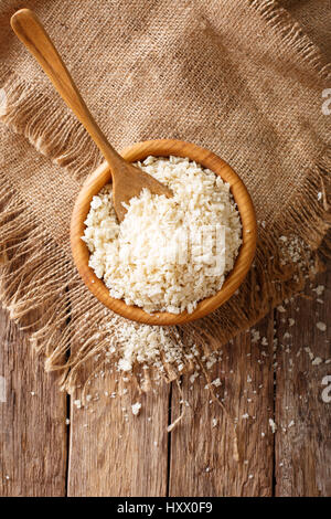 Japanese bread crumbs Panko in a bowl on the table. vertical view from above Stock Photo