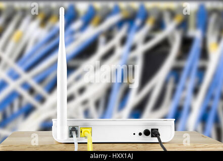 Wireless modem router with cable connecting on the local area network Stock Photo