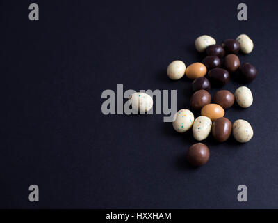 Chocolate easter eggs isolated on black background Stock Photo