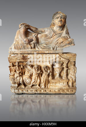 Etruscan Hellenistic style cinerary, funreary, urn , inv no 5774,  National Archaeological Museum Florence, Italy , against grey Stock Photo