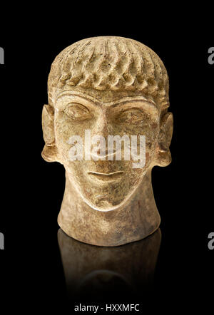 First half of the 6th century B.C Etruscan clay head of a young man made in Chiusi, inv 94612, National Archaeological Museum Florence, Italy , black  Stock Photo