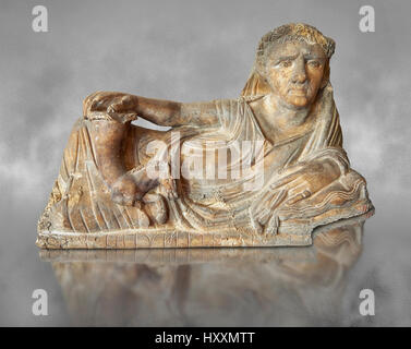 Etruscan Hellenistic style cinerary, funreary, urn  cover,  National Archaeological Museum Florence, Italy , grey art background Stock Photo