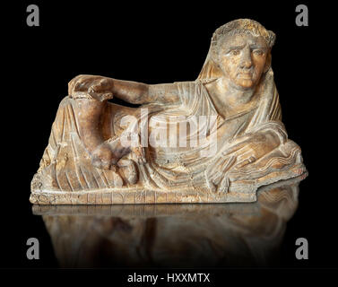 Etruscan Hellenistic style cinerary, funreary, urn  cover,  National Archaeological Museum Florence, Italy , black background Stock Photo