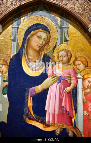 Gothic Altarpiece of Madonna and Child enthroned with angels byPero di Giovanni known as 'Lorenzo Monaco' circa 1415-1420, MNAC  inv no: MNAC 212808. Stock Photo