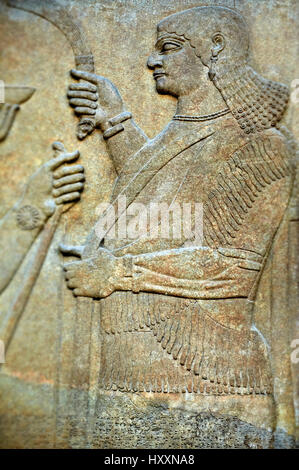 Assyrian relief sculpture panel  from Nimrud, Iraq.  865-860 B.C North West Palace.  British Museum Assyrian  Archaeological exhibit. Stock Photo