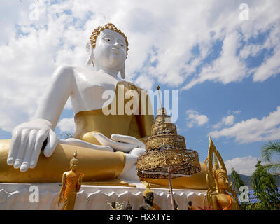 Giant Buddha statue at Wat Phra That Doi Kham (Temple of the Golden Mountain) in Chiang Mai, Thailand Stock Photo