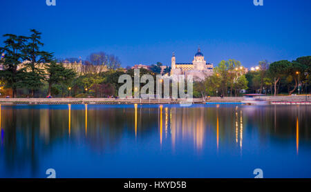 The Casa de Campo park in Madrid, Spain, is the biggest green area in the city. From the lake margins one has a beautiful of the Cathedral. Stock Photo