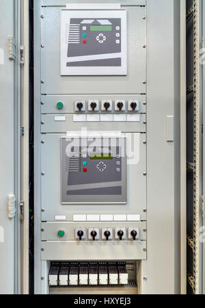 Electrical control panel with electronic devices in modern electrical substation Stock Photo