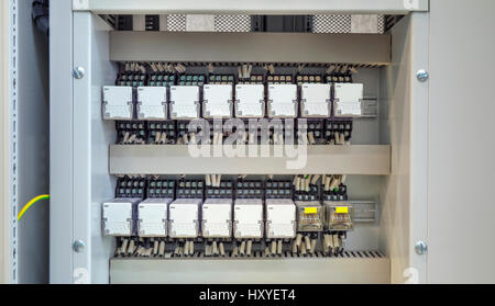 Electrical control panel with electronic devices in modern electrical substation Stock Photo