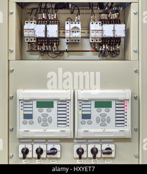 Electrical control panel with electronic devices in modern electrical substation Stock Photo