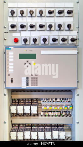 Electrical control panel with electronic devices in modern electrical substation Stock Photo