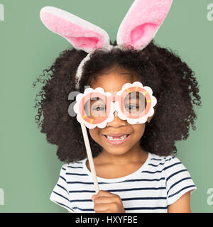 African Descent Little Girl Bunny Ears Concept Stock Photo