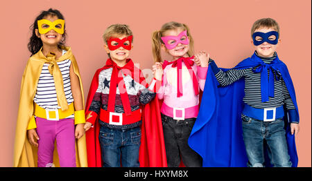 Little Kids Dressing Superhero Hold Hands Stock Photo