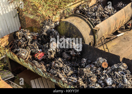 GRIMSBY, ENGLAND - MARCH 14: Scrap metal and car/auto engine parts in British scrap yard. In Grimsby, North Lincolnshire, England. On 14th March 2017. Stock Photo