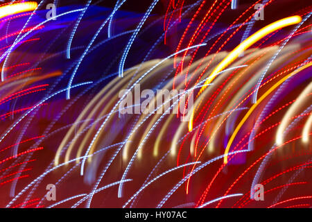 Abstract background with light trails of different colors Stock Photo