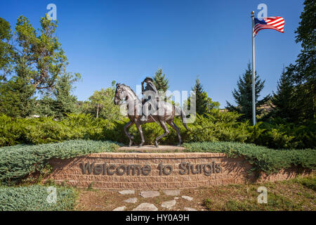 Welcome to Sturgis Sign, Sturgis, South Dakota. A stock photo of the towns namesake, General Samuel D. Sturgis on  horseback, says welcome to Sturgis Stock Photo