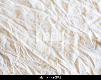 the crumpled white fabric texture surface background Stock Photo