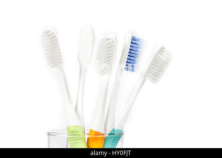 close up  toothbrush in transparent glass on white background Stock Photo