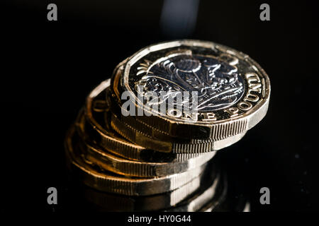 2017 new pound coins against black background Stock Photo