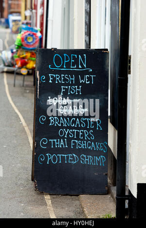 Fishmonger signs, outside fish shop in Norfolk, England Stock Photo - Alamy