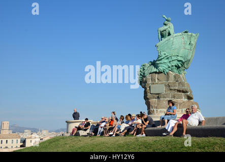 People Relax in the Sun & Enjoy the View from the Parc du Pharo or Pharo Park Beneath the Sailors' Monument Marseille Stock Photo