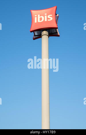 ibis Hotels pylon against blue sky. ibis is an international hotel chain with over 1,000 facilities worldwide. Stock Photo