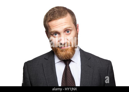 Unhappy dissatisfied businessman. isolated on white, looking at camera. Stock Photo