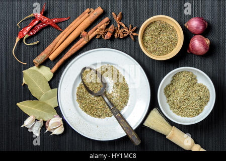 Variety herbs over black background, cooking concept Stock Photo