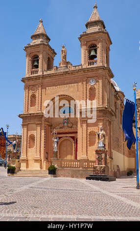 The view of the parish church of Our Lady of Pompei in the Marsaxlokk fishing village, Malta Stock Photo