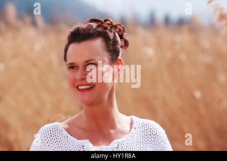 Portrait of a smiling middle-aged woman Stock Photo