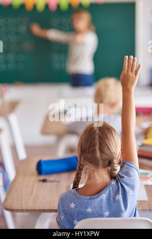 Girl knowing best answer for the question Stock Photo