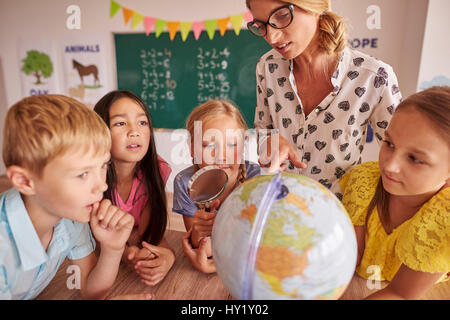 Pupils curious of the world Stock Photo