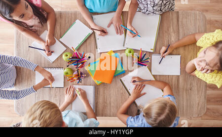 High angle view of drawing kids Stock Photo