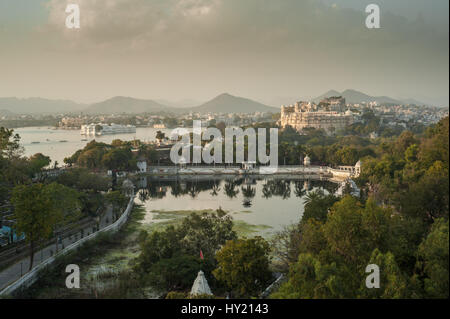 View from ropeway to Lake Palace and City Palace, with Dudh Talai & Manik Lal Verma Park in foreground Stock Photo