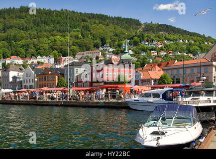 On this image you can see the harbour and historic inner city of Bergen, the second largest city in Norway. In front you can see a lot of motor boats  Stock Photo