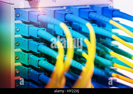 fiber optic telecommunication cables on blur background Stock Photo