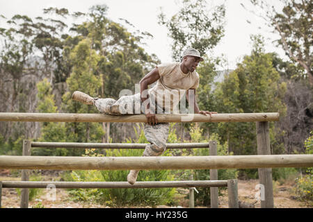 Military soldier training on fitness trail at boot camp Stock Photo