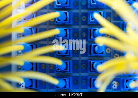 fiber optic telecommunication cables on blur background Stock Photo