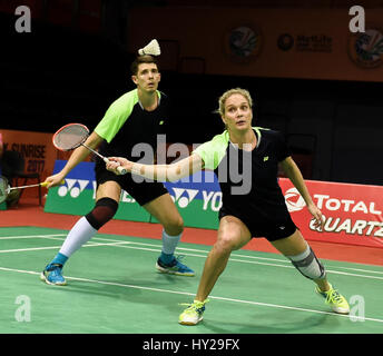 New Delhi, India. 31st Mar, 2017. Evgenij Dremin and Evgenia Dimova of Russia compete during the quarterfinal of mixed double against Lu Kai and Huang Yaqiong of China in Yonex Sunrise Indian Open Badminton Championship in New Delhi, India, March 31, 2017. Lu Kai and Huang Yaqiong won 2-0. Credit: Bi Xiaoyang/Xinhua/Alamy Live News Stock Photo