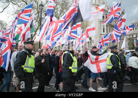 London UK 01 April 2017 The EDL (English Defence League) and Britain First staged a march trough central London to protest at what they see a weak response to the terrorist act committed in London few weeks ago and to what they see as the Islamic Threat,Counter Demonstrators from the AFL (Anti Fascist  League ) clashed with police. Credit: Paul Quezada-Neiman/Alamy Live News Stock Photo