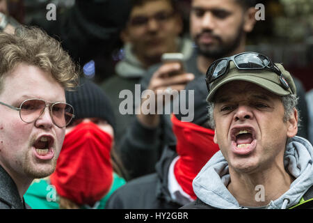 London, UK. 1st April, 2017. Anti-Fascist groups including Unite Against Fascism (UAF) clash with police with some arrests being made whilst counter-protesting far-right British nationalist groups including Britain First and the English Defence League (EDL) during their “march against terrorism” through central London in light of the recent terror attacks in Westminster. Police arrested 14 people during the clashes. © Guy Corbishley/Alamy Live News