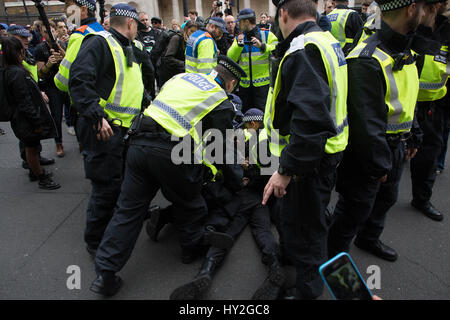 London, UK. 1st Apr, 2017. English Defence League march a protester under arrest in Whitehall Credit: Brian Southam/Alamy Live News Stock Photo